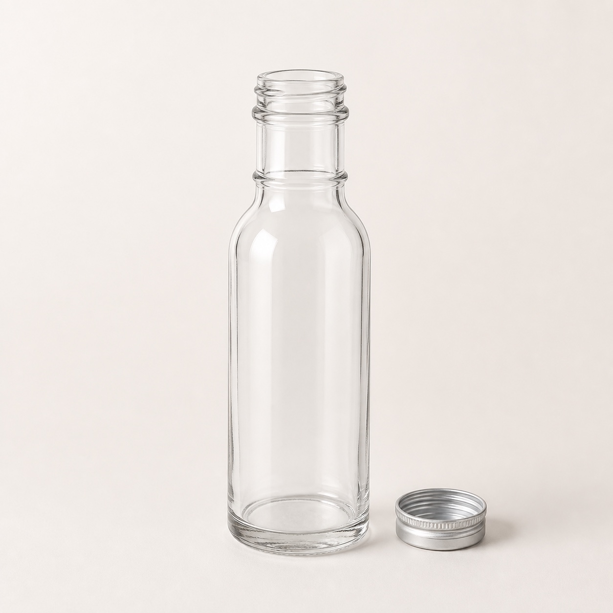 Unbranded ring-neck glass dressing and sauce bottles
